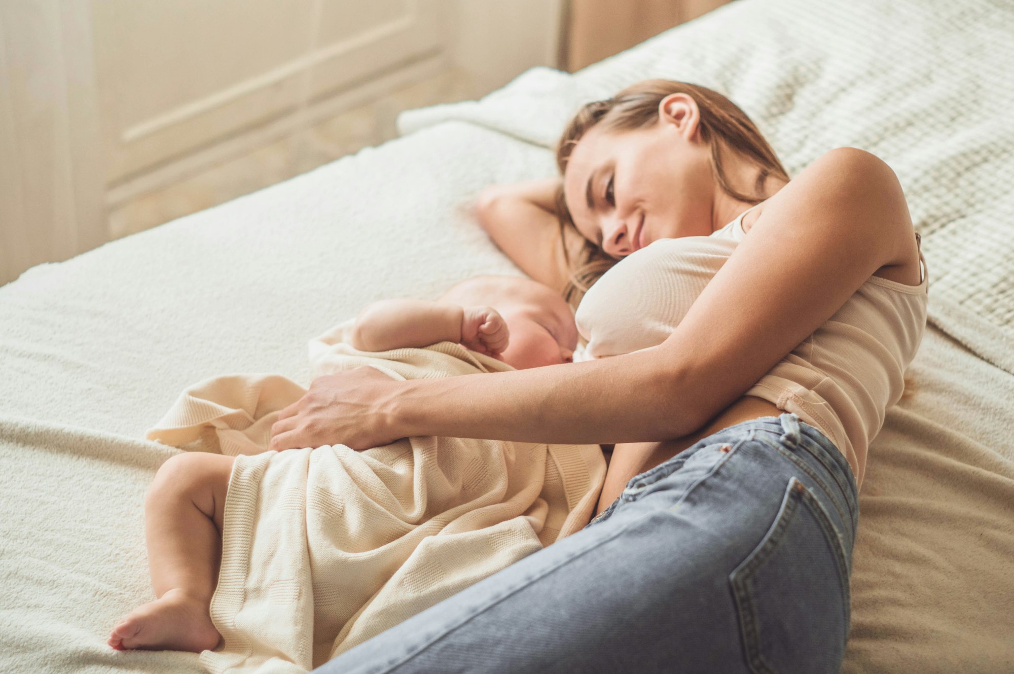 Portrait of a mom and breast feeding baby